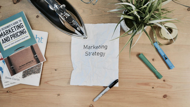 marketing strategy plan on desk